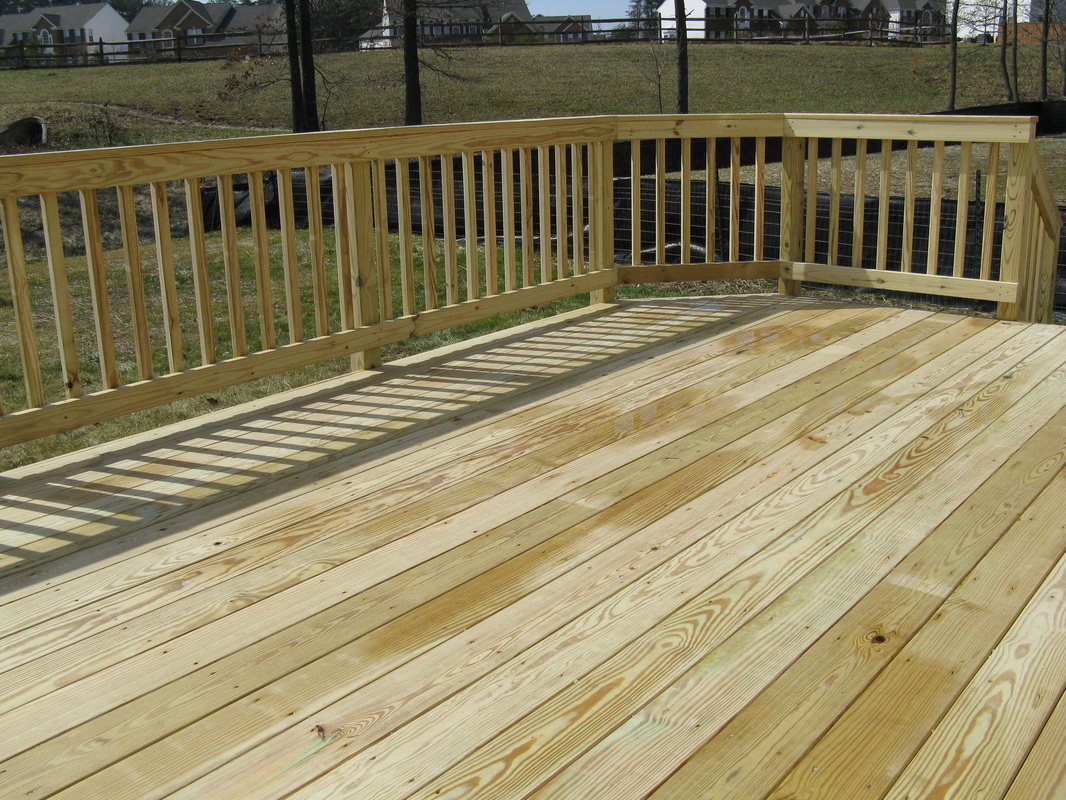Harford County Maryland Pressure-Treated Pine Wood Decking with Colonial Sweep Railings.